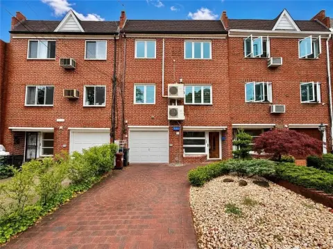 Attached Brick 3-Family Home