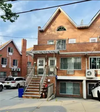 Renovated Corner Two-Family Home