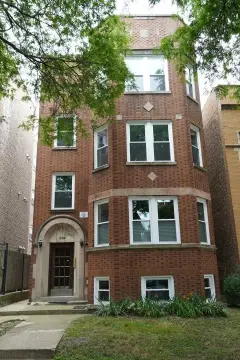 Brick Triplex With Three-Car Garage