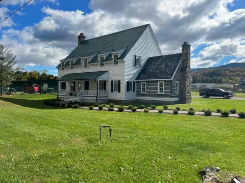 Custom Office Building with Log Addition