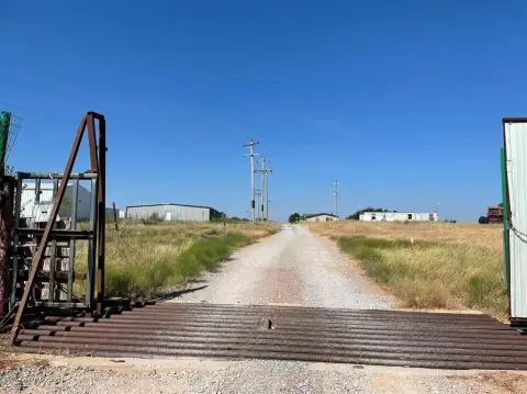 Agricultural Land with Metal Buildings