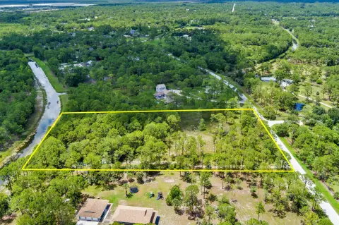 Partially Cleared Fenced Equestrian Homesite