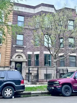 Renovated Three-Unit Brick Triplex