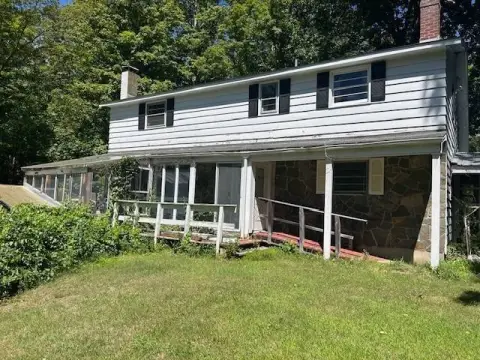 Brunswick Farmhouse with Acreage and Barn