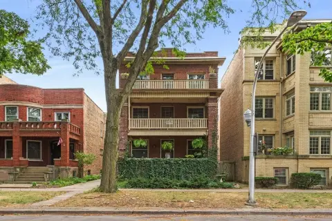 Brick Triplex With Owner’s Duplex