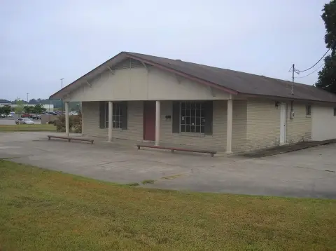 Corner Retail Storefront in Front of Walmart