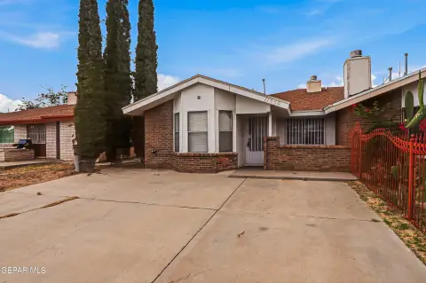 Brick Duplex with Walled Backyard