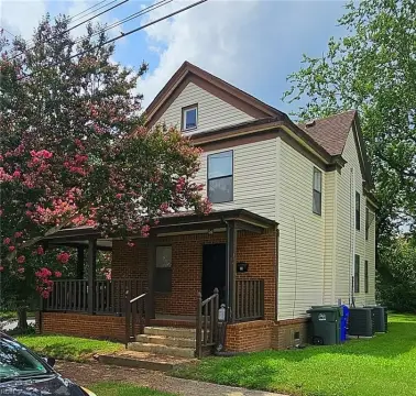 Waterfront Duplex with Vacant Lot