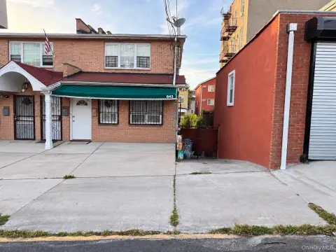 Two-Family Duplex with Driveway