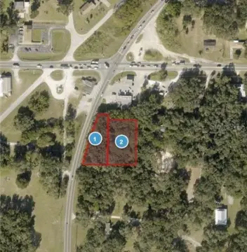 Commercial Land in Okahumpka, FL
