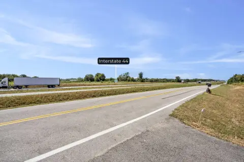 Commercial Land with Existing Improvements