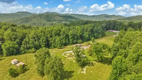 Acreage with Barn and Outbuildings