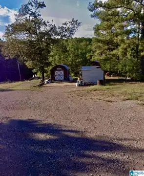 A1-Zoned Land with Storage Building