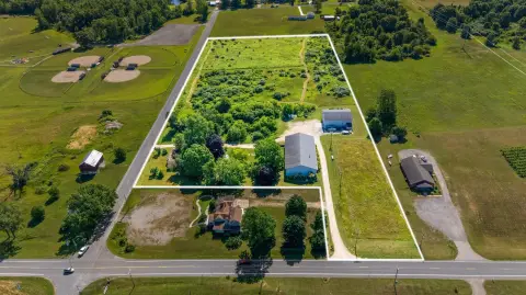 Industrial Parcel with Pole Barns