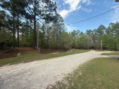 Wooded Acreage in Gated Community