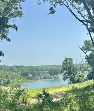 Wooded Walkout Lakefront Lot