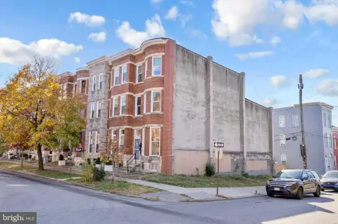 Three-Unit Brick Multifamily with Backyard