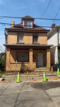 Brick Apartment Building With Garage