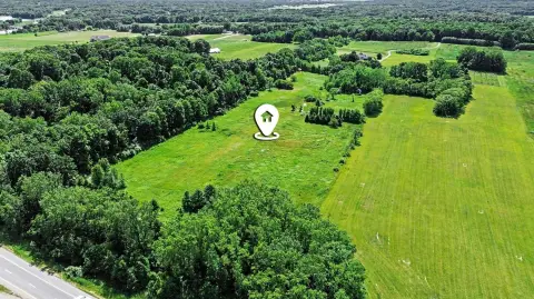 Farm Parcel with Greenhouse Anchors
