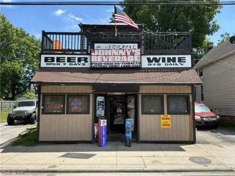 Corner Retail Storefront with Apartment