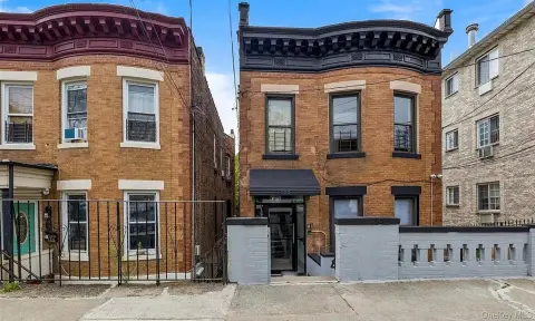 Detached Brick Triplex