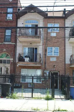 Legal Three-Family with Gated Driveway