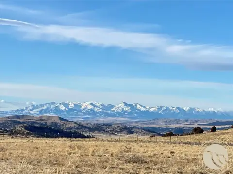 Fenced Agricultural Land with Mountain Views