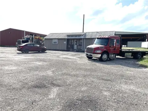 Fenced Yard Auto Shop Buildings