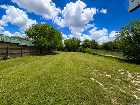 Fenced Commercial Potential Lot