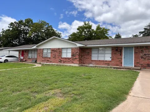 Brick Duplex with Fenced Yards