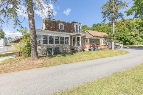Updated Triplex With Owner Suite