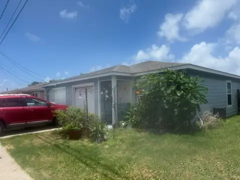 Fully Occupied Duplex with Attached Garages