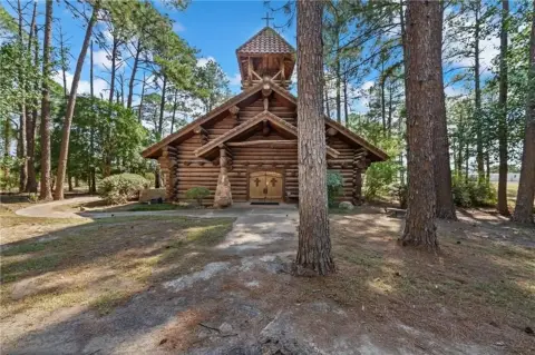 Log Cabin Church on Acres