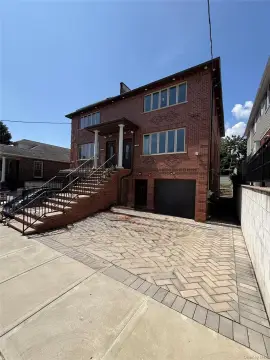 Brick Duplex With Separate Entrances