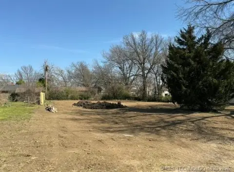 Fenced Vacant Land
