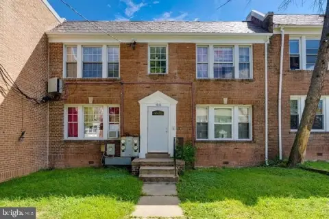 Brick Quadplex With Dens