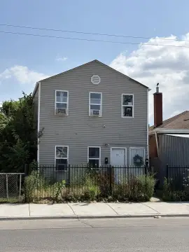 Rehabilitated Two-Flat Duplex
