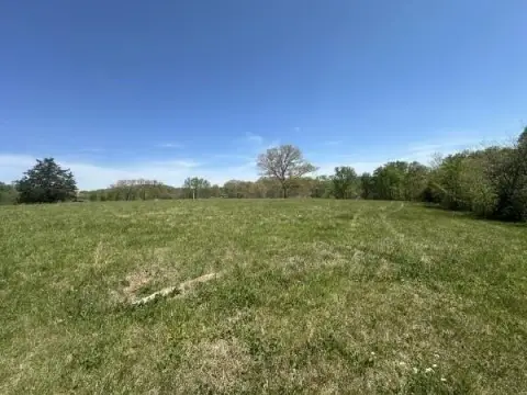 Pastureland with Barn and Pond