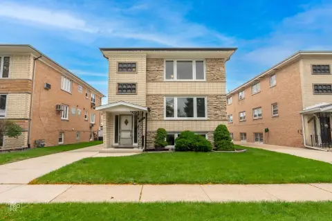 Brick Duplex with Garden-Level Unit