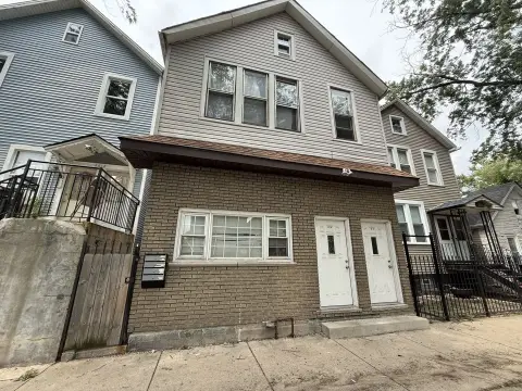 Brick Triplex with Unfinished Attic