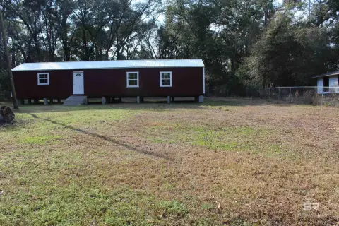 Cleared Lot with Storage Building