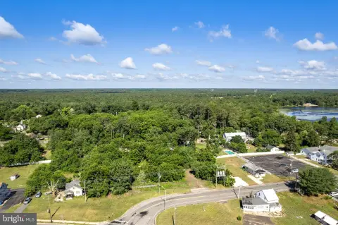 Wooded Commercial Land with Road Frontage