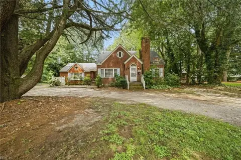 Brick Triplex with Screened Porch