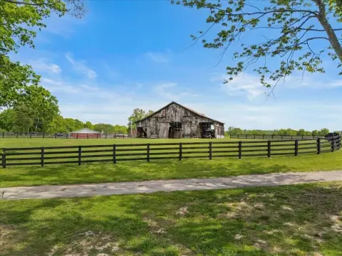 Fenced Pasture Farm With Barn