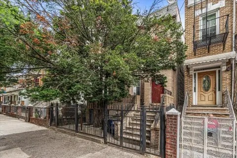 Brick Three-Family Property