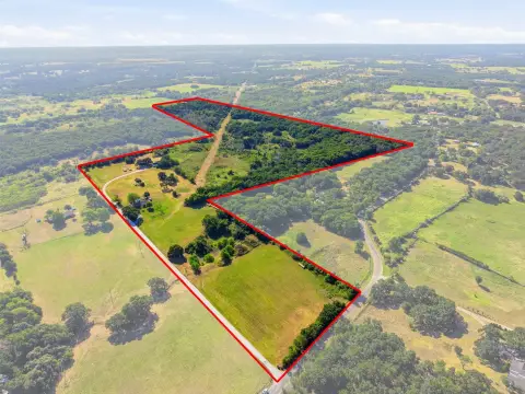 Fenced Agricultural Tract With Homes