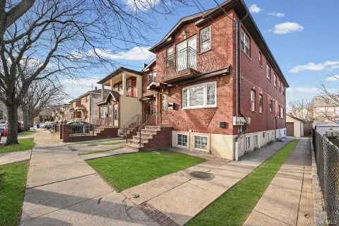 Modern Two-Family Duplex with Detached Garage