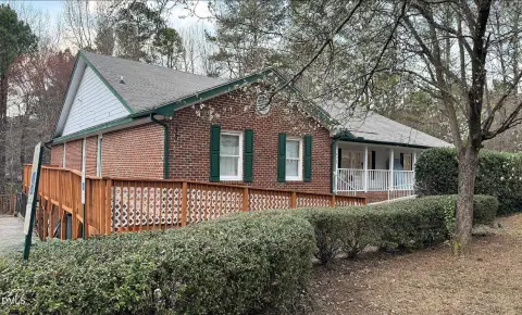 Brick Office Building with Fenced Yard