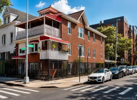Brick Triplex with Corner Presence