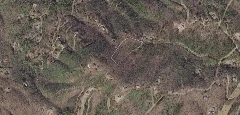 Wooded Mountain Lot Near Towns